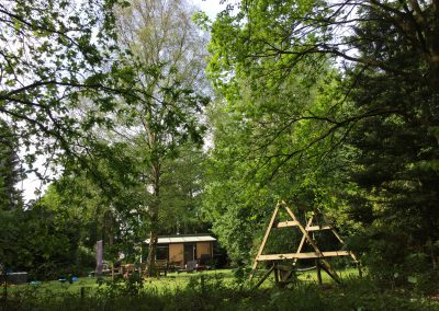 Vakantiehuis Drenthe | Uitzicht vanaf het buitenbed in het bos